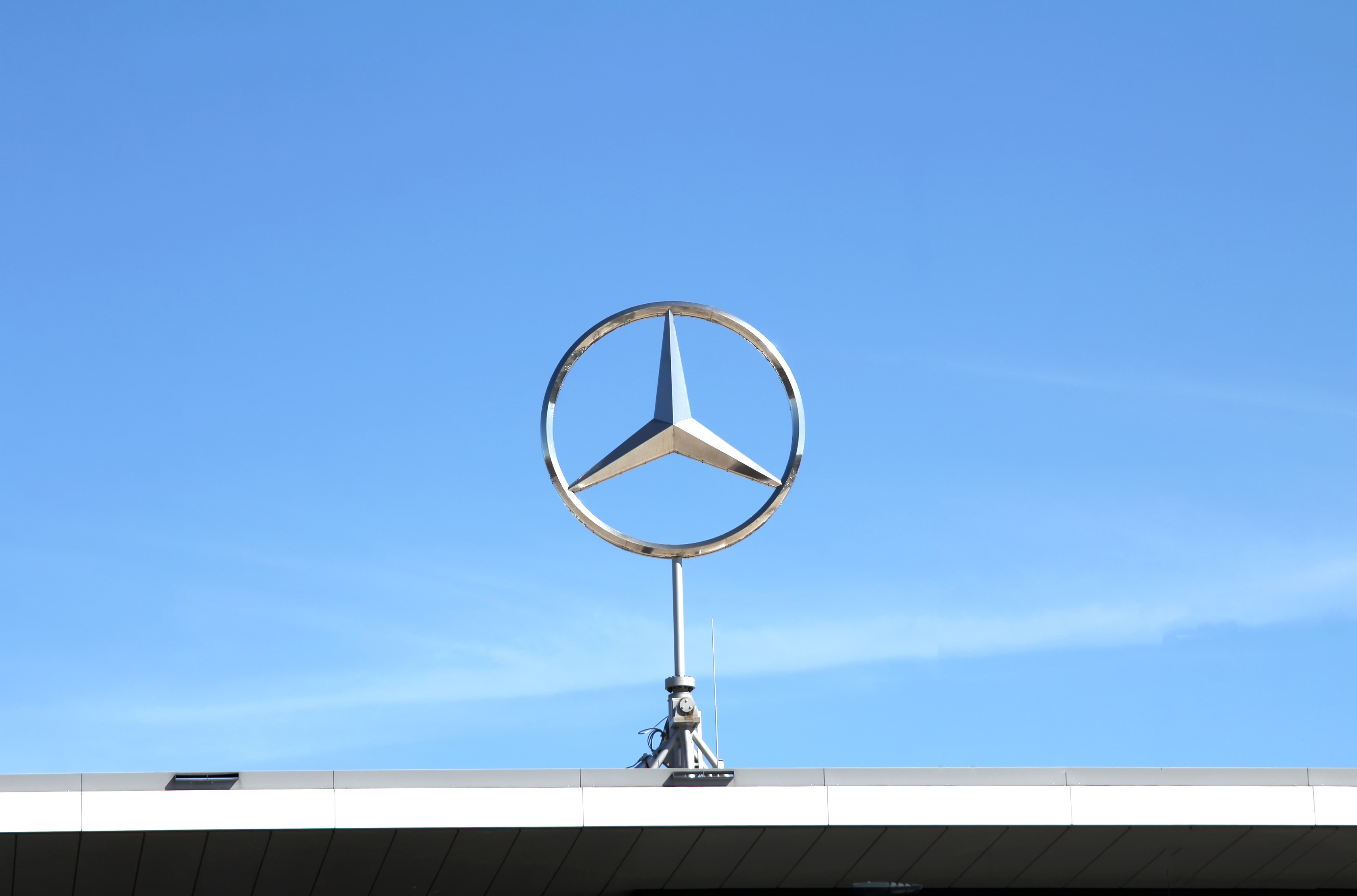 Nurnberg, GERMANY : Mercedes Benz logo close up on a dealer building. Mercedes-Benz is a German automobile manufacturer. The brand is used for luxury automobiles, buses, coaches and trucks.