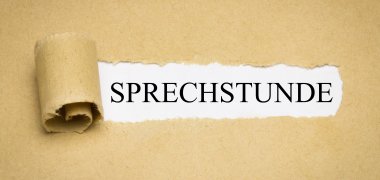 Text Sprechstunde hinter braunem Papier